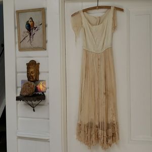 CreepyBeautiful antique tattered display dress